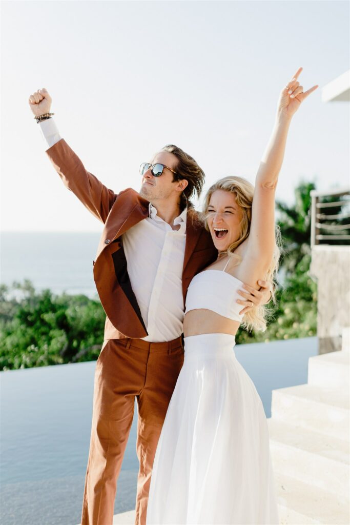 Sunset vows on Costa Rican shores: Katie and Justin exchange promises framed by golden hues and ocean waves